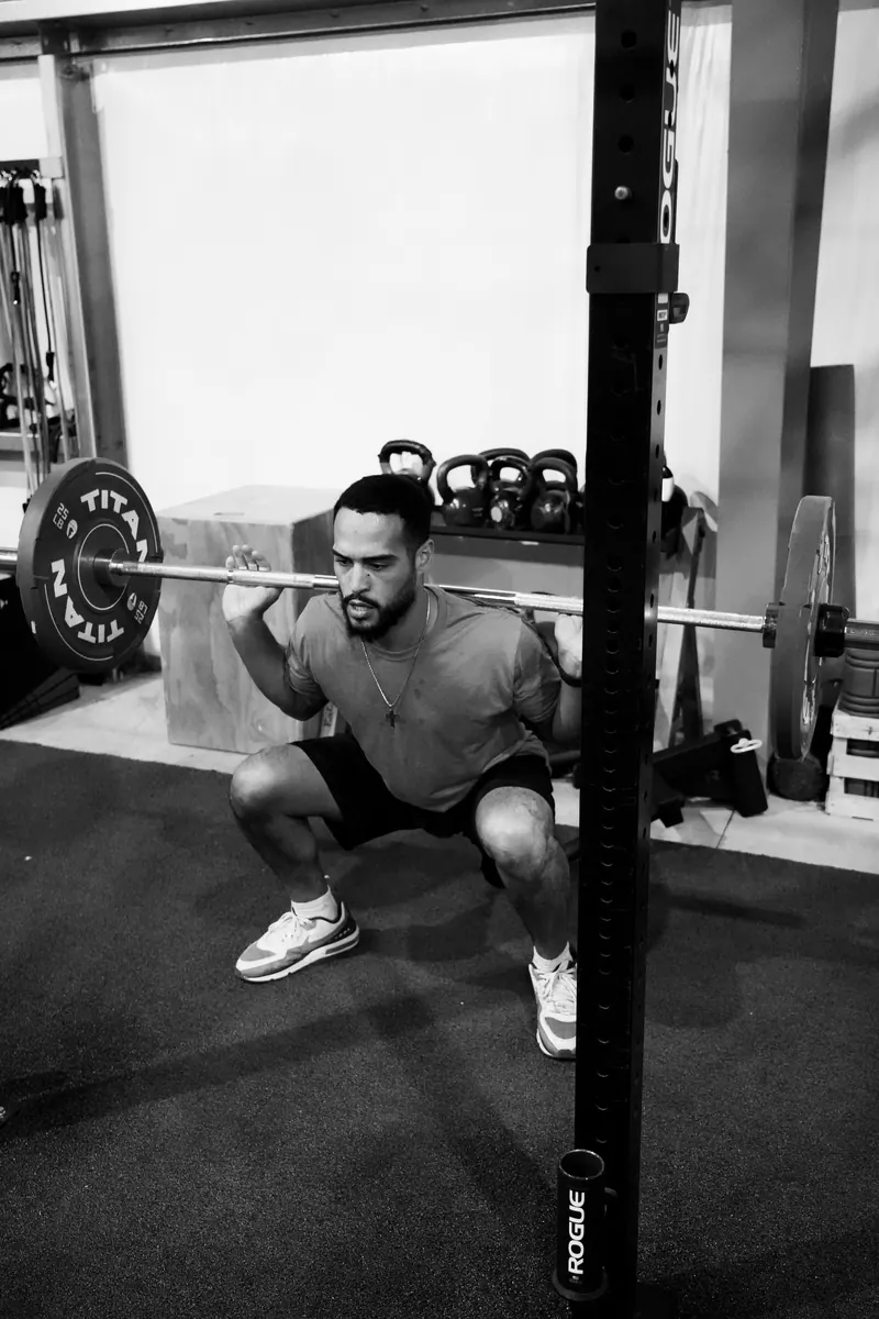 Jeremiah back-squatting in the rack