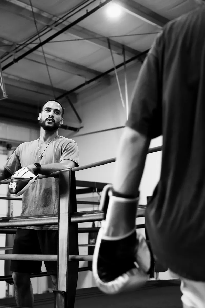 Jeremiah watching a client work from the ropes